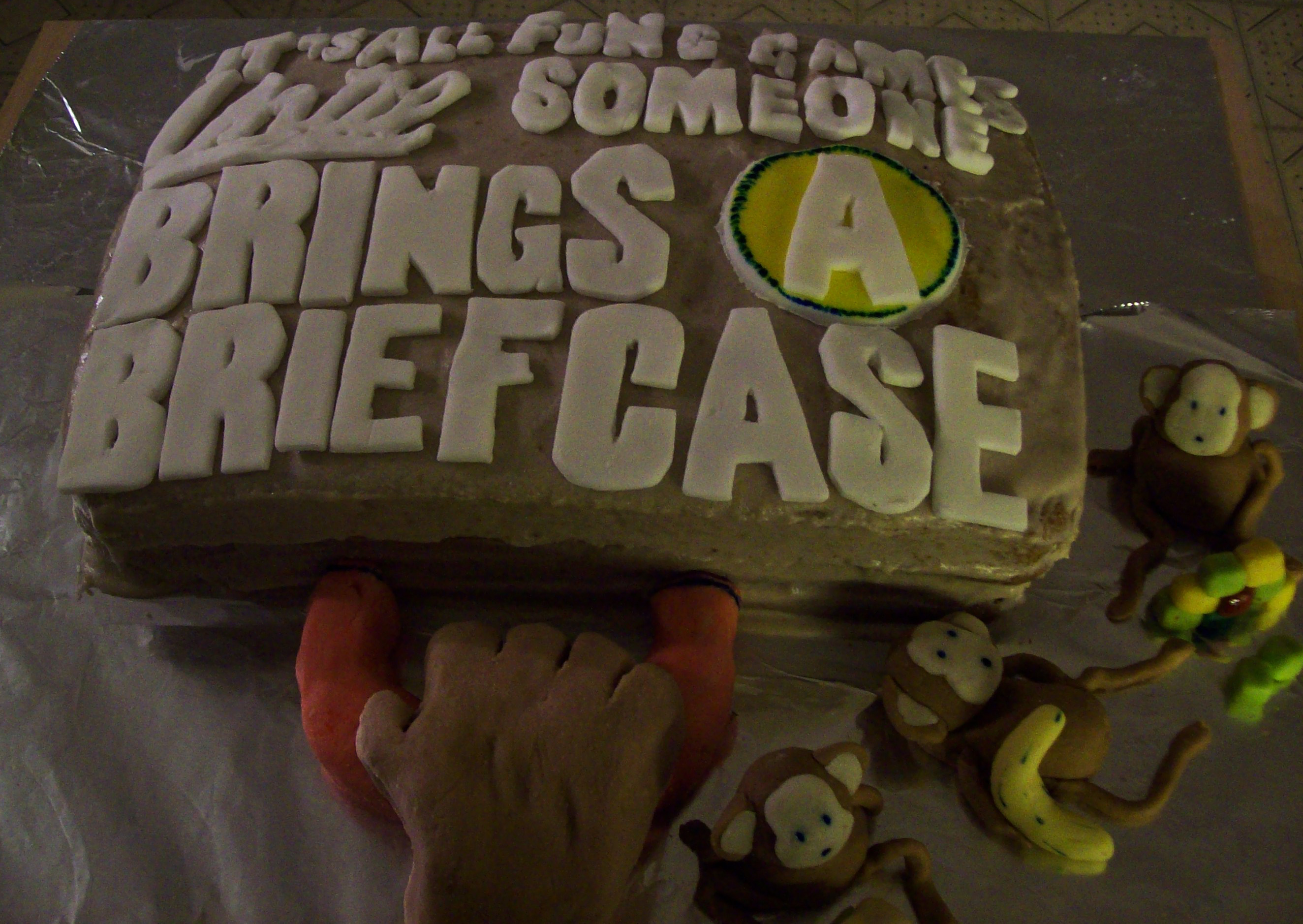 It's All Fun and Games Until Somebody Brings a Briefcase cake