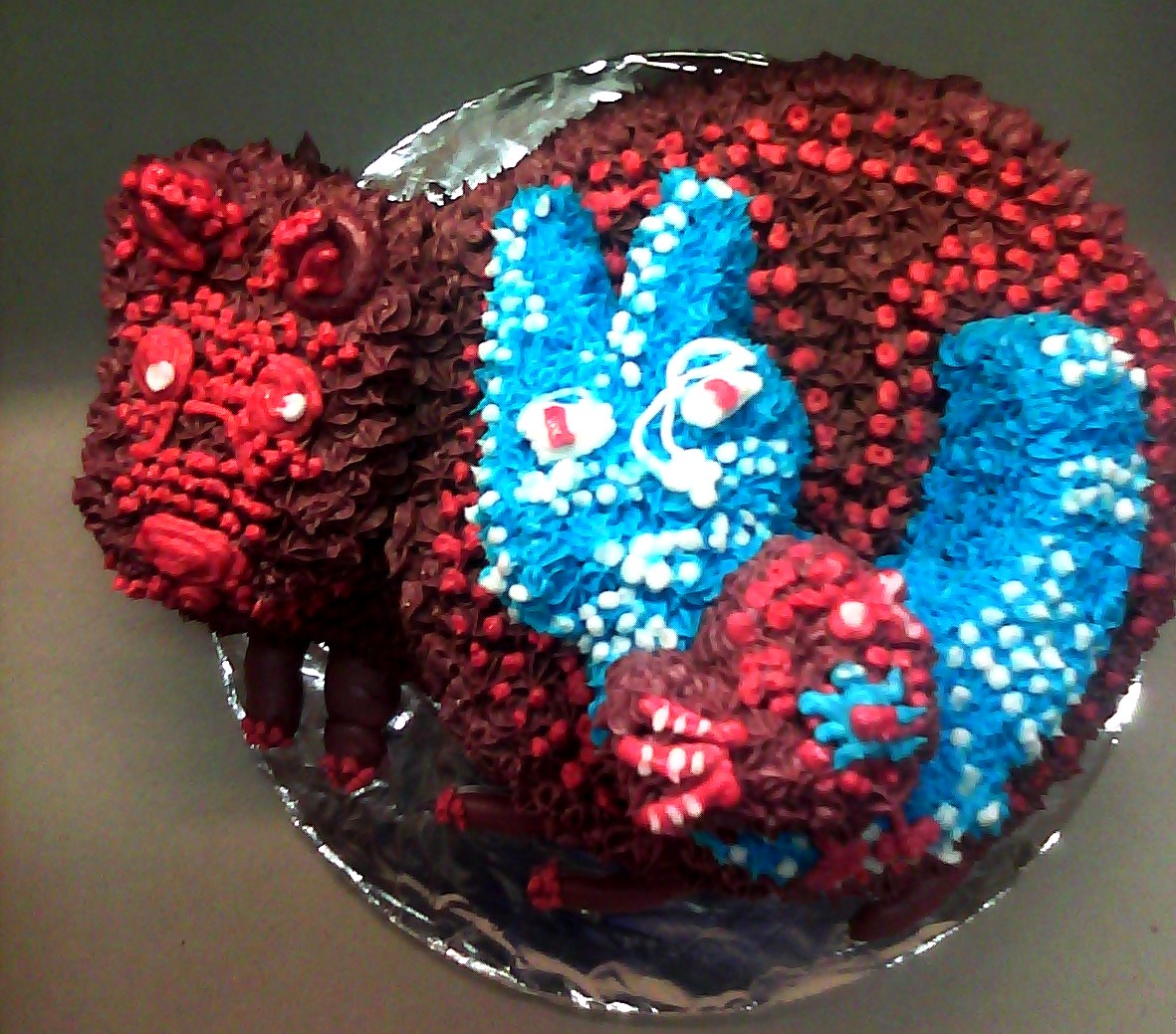 I Know An Old Lady Who Swallowed A Fly cake by Rodenial White