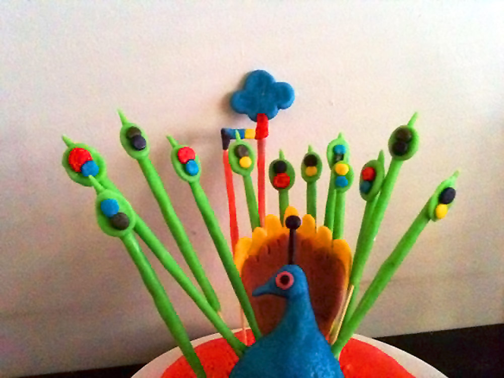 Peacocks Are Pigeons Zapped by Rainbows cake